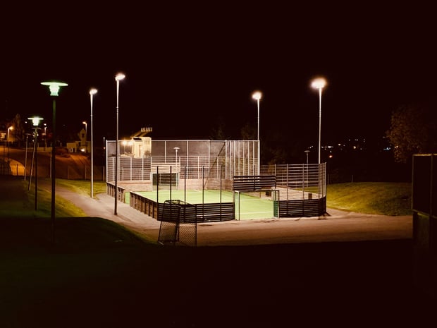 Floodlit field at night