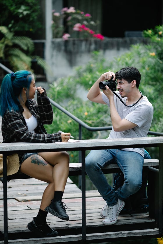 Roaming photographer taking a guest portrait