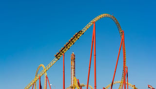 Roller coaster against a blue sky