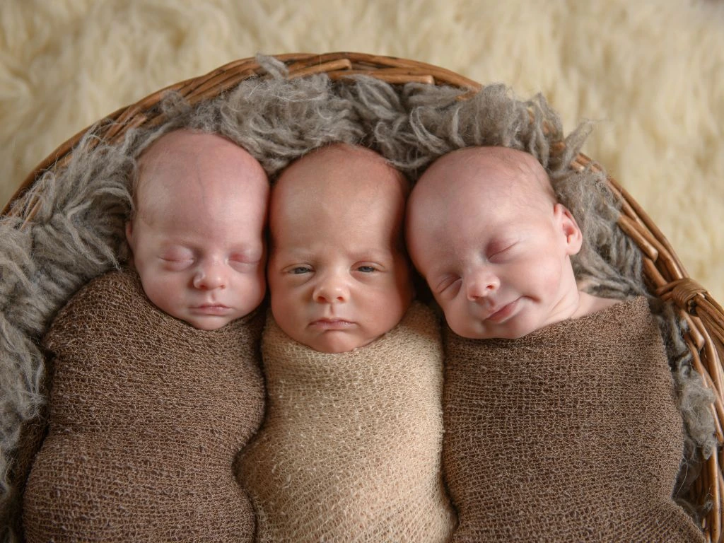 photo of 3 babies sleeping