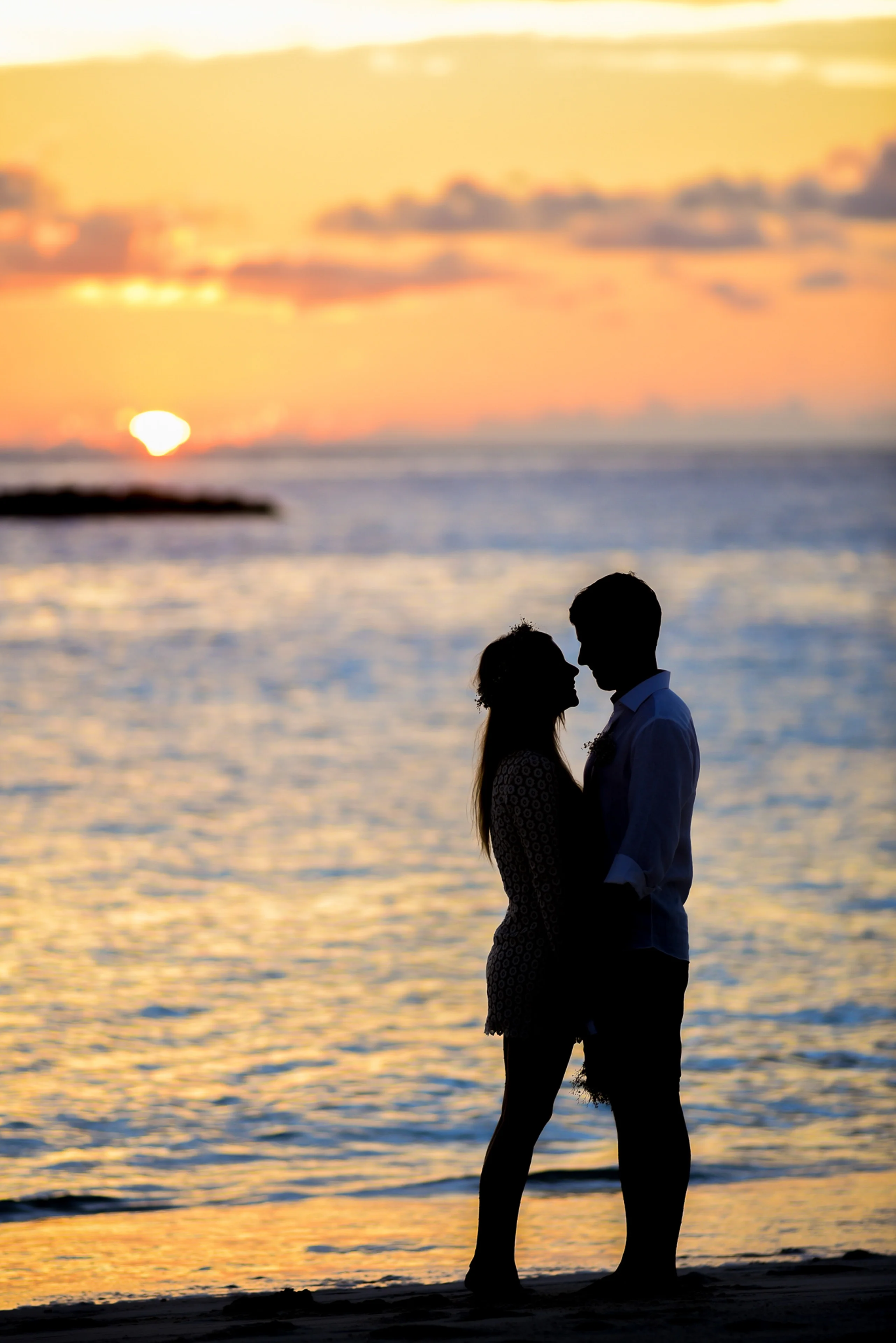a romantic beach photograph of couple