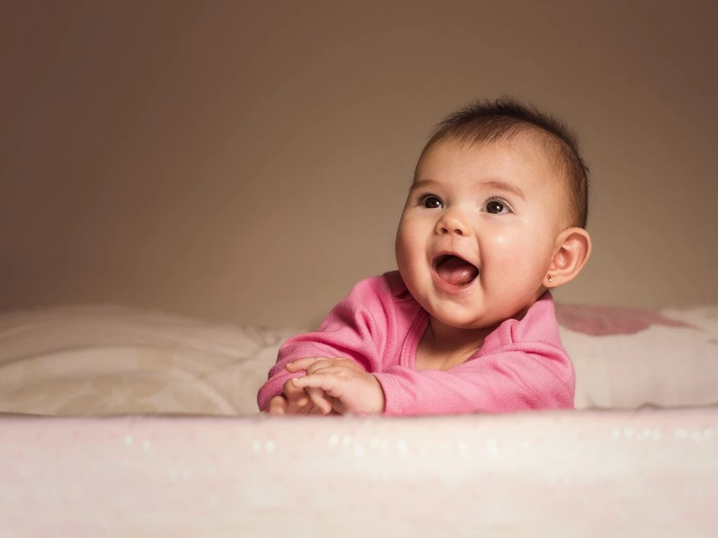 photo of a baby playing