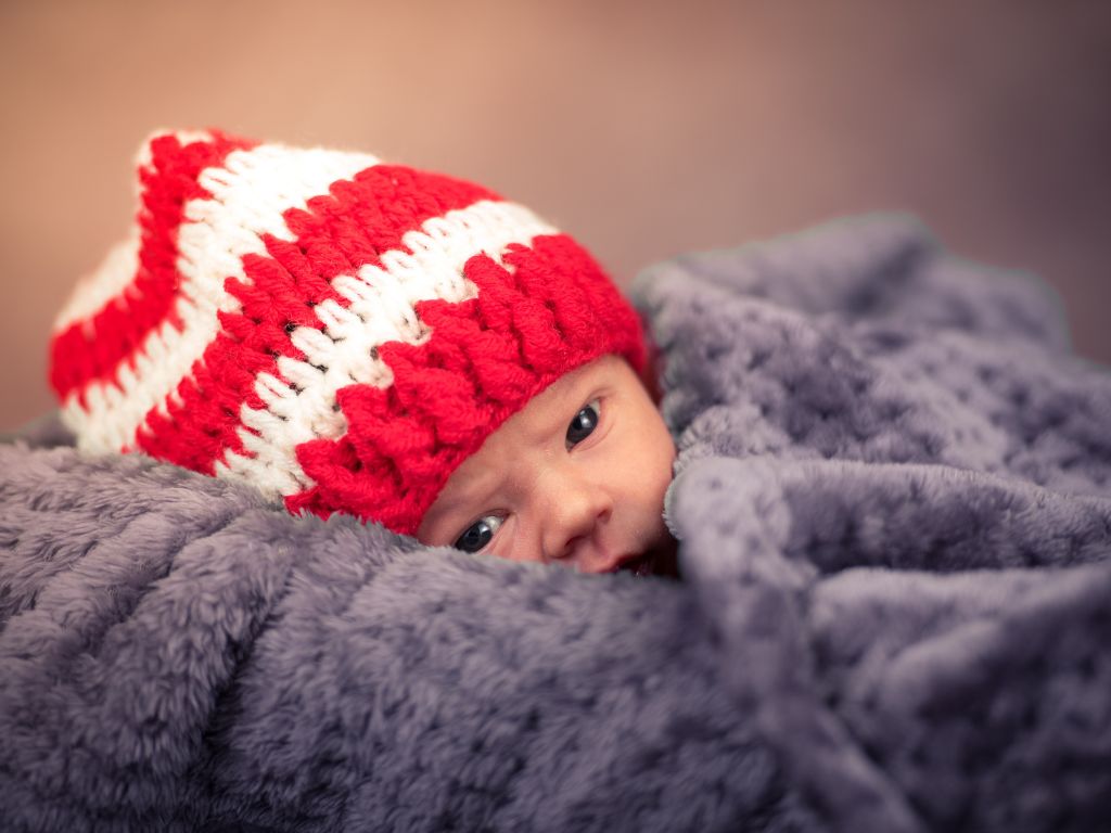 photo of a baby in a hat