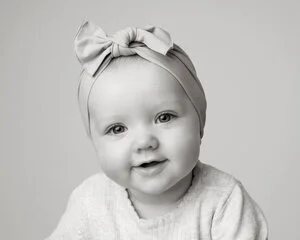 black and white soft edit portrait of a baby